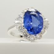 A certified loupe clean natural tanzanite and diamond ring in 18ct white gold