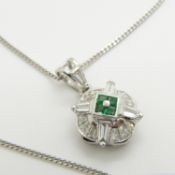 An unusual Art Deco-style baguette diamond and calibre-cut emerald necklace, boxed