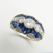 A fine quality, stylish platinum dress ring set with diamonds and sapphires