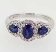18ct (750) White Gold 1.26ct Oval Sapphire & 0.38ct Diamond Cluster Ring