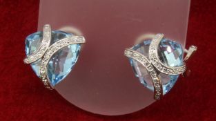 9ct 375 White Gold Diamond & Trillion Cut Topaz Stud Earrings