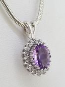 9ct (375) White Gold Oval Amethyst & Diamond Cluster Pendant