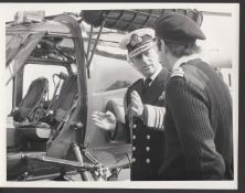 Royalty The Duke of Edinburgh discusses the finer points of flying with the pilot of the Wasp Helico