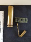 Military Brass Gun Barrel inspecion Tool and a Shell Case