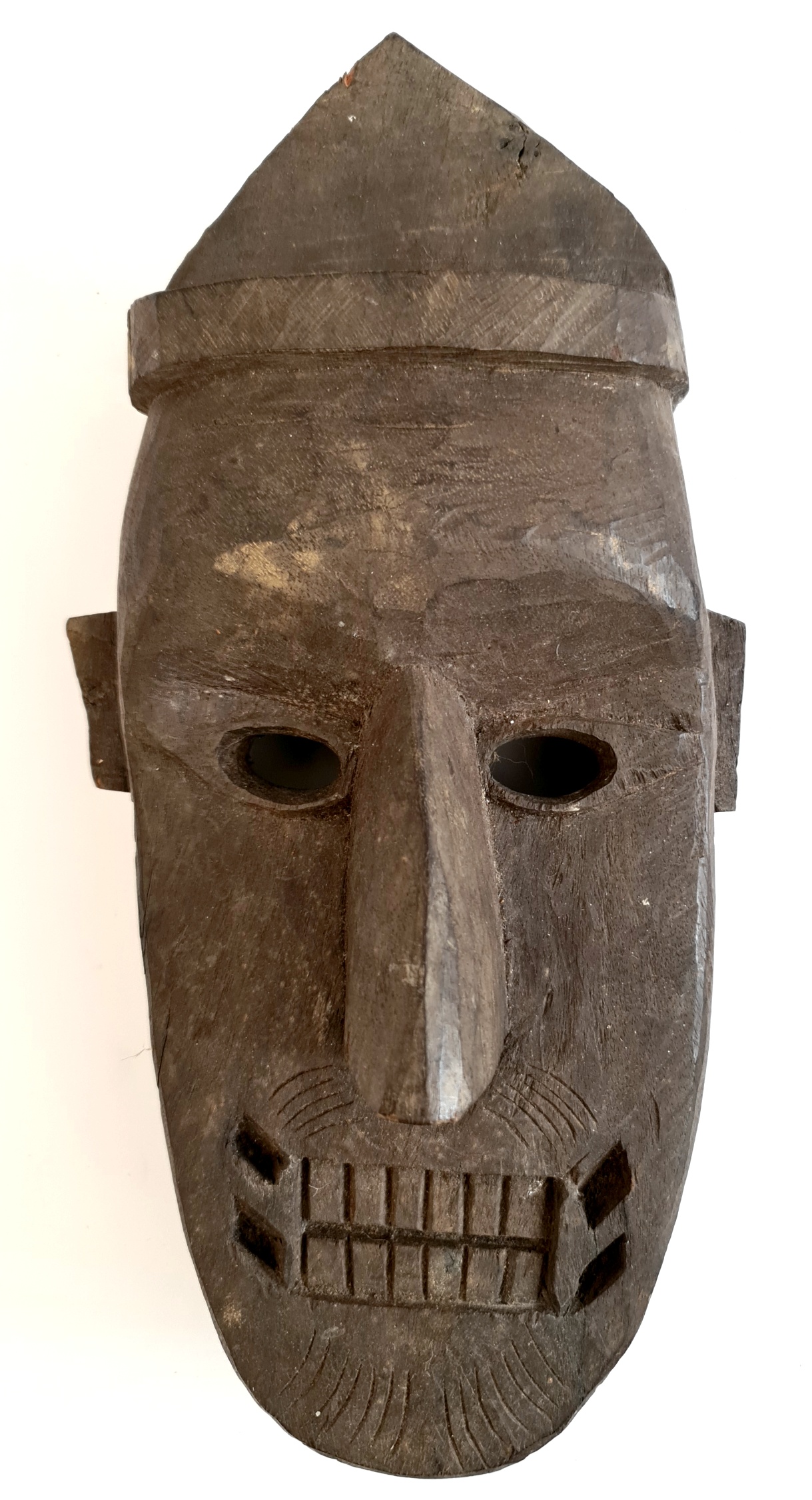 Vintage African Wood Tribal Mask     Vintage African Wood Tribal Mask.Measures 12 inches long.. Part