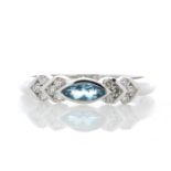 9k White Gold Diamond And Blue Topaz Ring