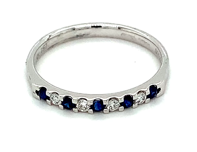 0.15ct sapphire and 0.08ct diamond eternity ring set in 18kt white gold