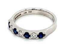 7 stone diamond and sapphire eternity ring in 18kt white gold