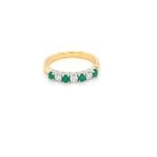 0.38ct emerald and 0.24ct diamond eternity ring set in 18kt white gold