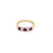 0.47ct ruby and 0.20ct diamond eternity ring set in 18kt white and yellow gold