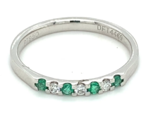 Natural green emerald and diamond ring in platinum 0.15ct total weight