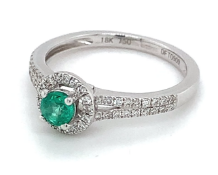 Natural green 0.26ct emerald and diamond ring in 18kt white gold