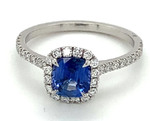 1.02ct dark blue cushion cut sapphire and diamond ring set in platinum