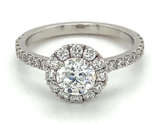 Round brilliant 0.90ct solitaire diamond set in a 1.00ct halo platinum setting. GIA certified