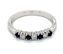 7 stone diamond and sapphire eternity ring in 18kt white gold