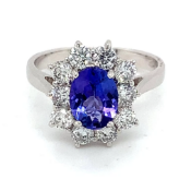 1.42ct dark blue AAAA oval tanzanite and diamond ring set in 18kt white gold