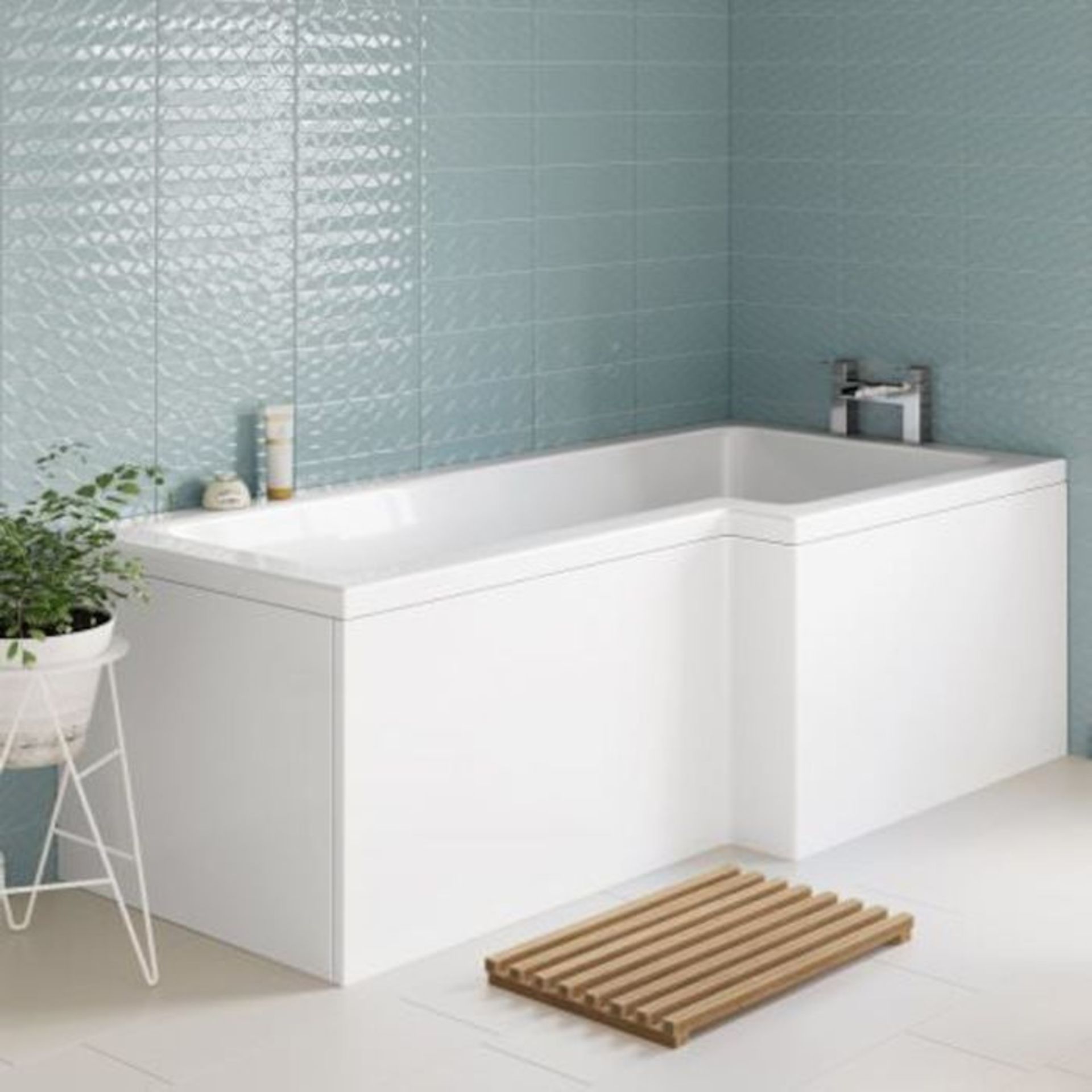 New (L2) 1700x850mm Right Hand L-Shaped Bath. SIDE PANELS NOT INCLUDED. Constructed from high...