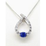 18ct (750) White Gold Open 0.32ct Sapphire & 0.24ct Diamond Pendant on Curb Chain - 18"