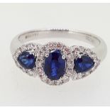 18ct (750) White Gold 1.26ct Oval Sapphire & 0.38ct Diamond Cluster Ring