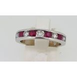 14ct (585) White Gold Ruby & 0.45ct Diamond 9 Stone Half Eternity Ring