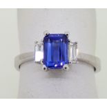 18ct (750) White Gold Emerald Cut Tanzanite and Diamond Ring