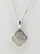 9ct (375) White Gold pave Set Diamond Flower Pendant on Curb Chain - 18"