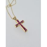 18ct yellow gold ruby set cross pendant