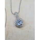 14ct white gold aquamarine and diamond pendant