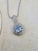 14ct white gold aquamarine and diamond pendant