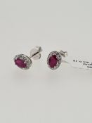 18ct white gold ruby and diamond stud earrings