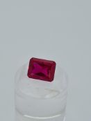 Synthetic ruby emerald cut stone