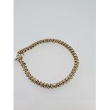 9ct yellow gold diamond set bracelet