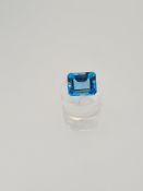 Blue topaz step-cut gemstone