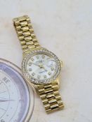 Rolex 18ct gold diamond bezel and diamond dial watch