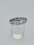 18ct UK hallmark channel set diamond ring