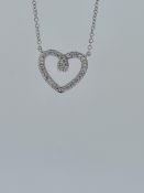 18ct white gold diamond set heart pendant with fitted chain