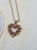 14ct yellow gold ruby and diamond heart pendant