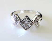 Sterling Silver Topaz & Diamond Ring