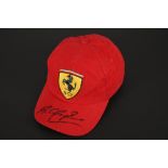 MICHAEL SCHUMACHER Original signature on cap.