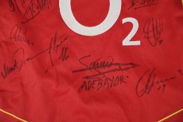 ARSENAL MATCH STRIP Signed by squad members.