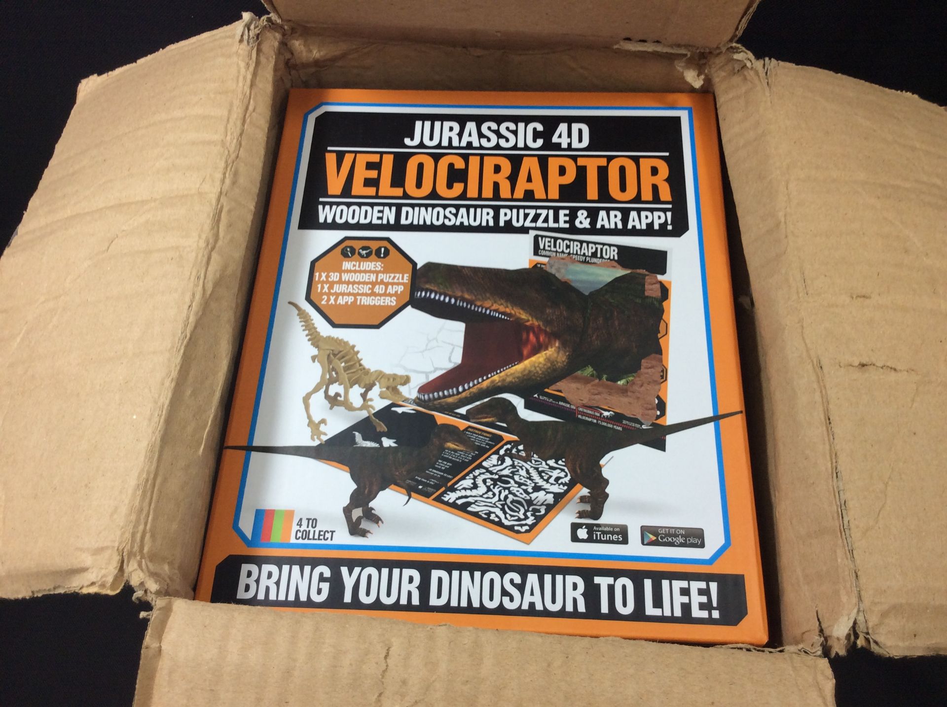 Box of jurassic 4d velociraptor puzzles