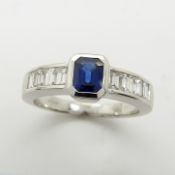 18ct white gold step-cut, sapphire and baguette-cut diamond dress ring