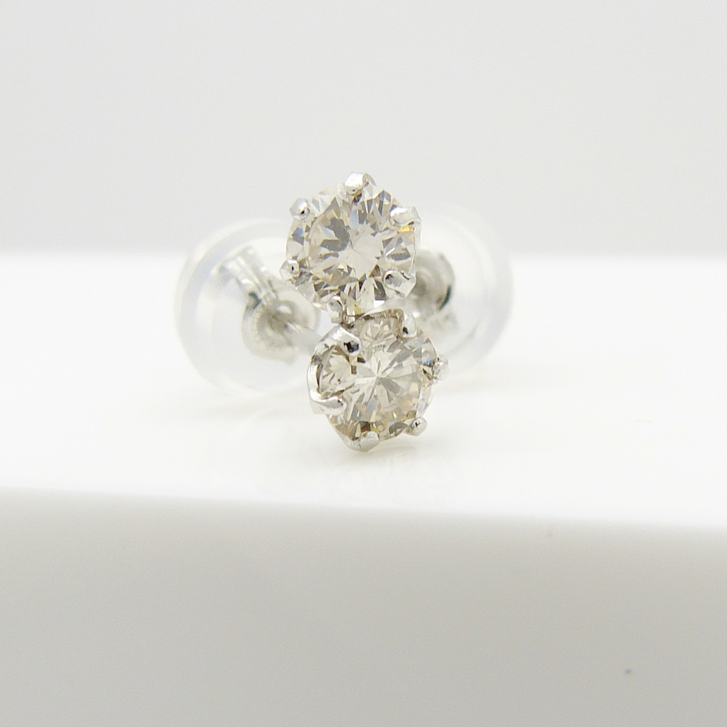 A pair of platinum 0.30 carat round brilliant-cut diamond solitaire ear studs, boxed - Image 2 of 7