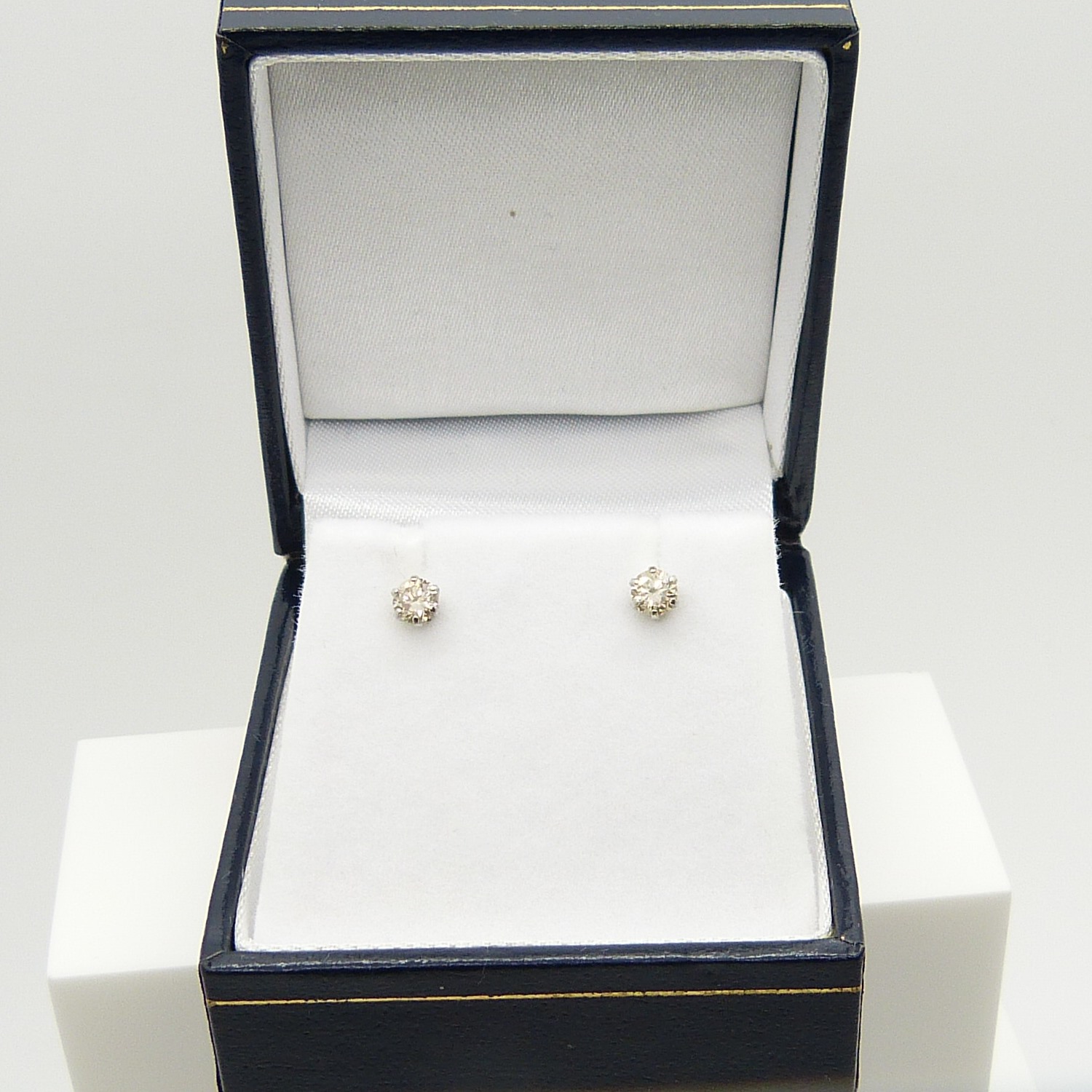 A pair of platinum 0.30 carat round brilliant-cut diamond solitaire ear studs, boxed - Image 3 of 7