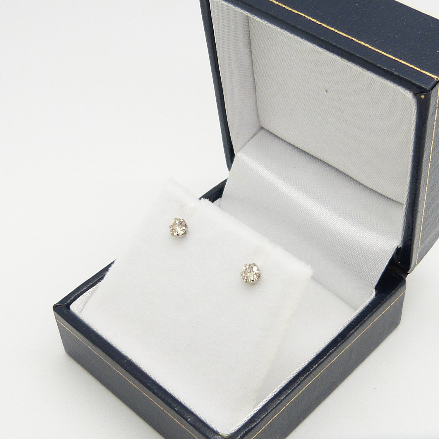 A pair of platinum 0.30 carat round brilliant-cut diamond solitaire ear studs, boxed - Image 5 of 7