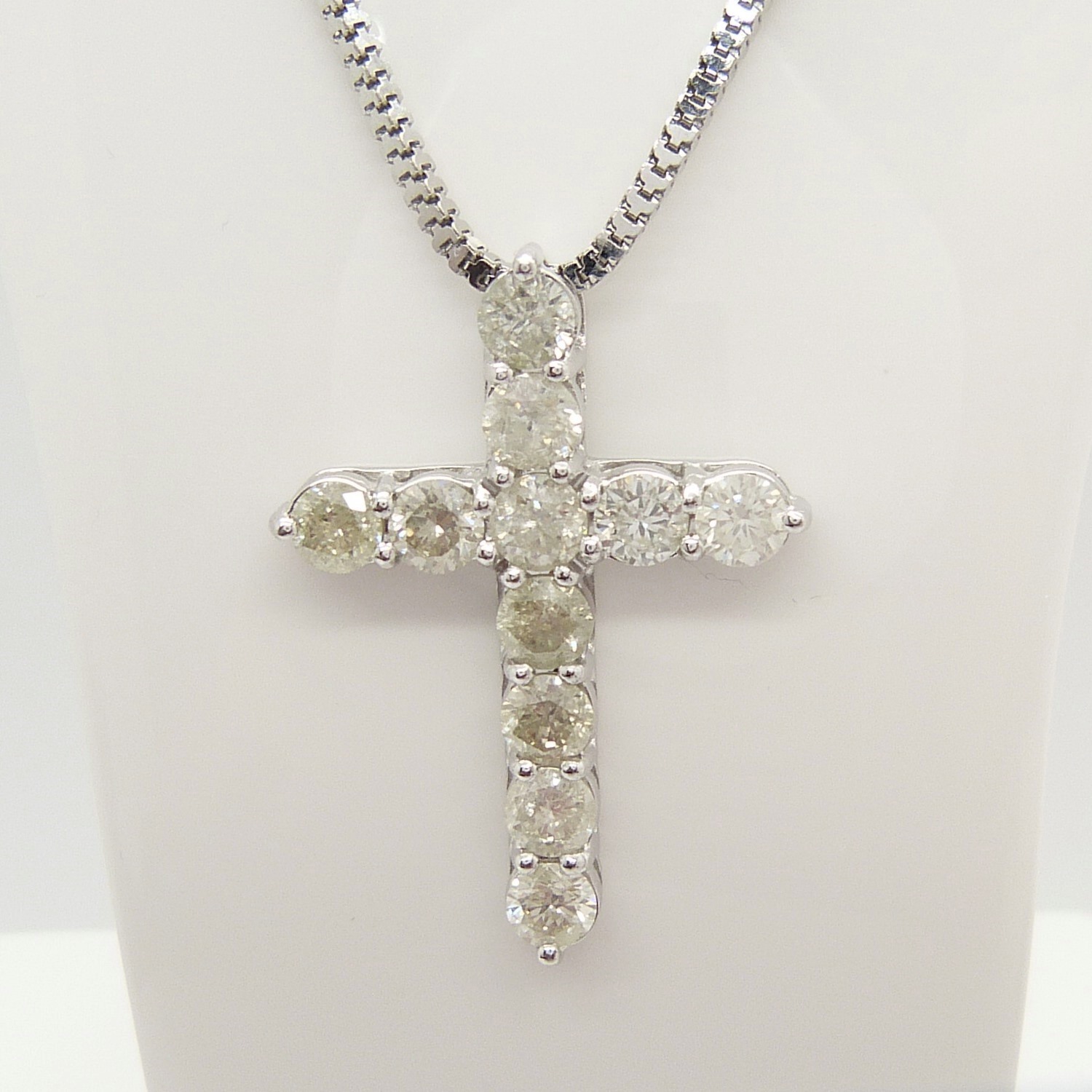 A 14ct white gold diamond cross pendant on a silver snake link chain, boxed - Image 3 of 6