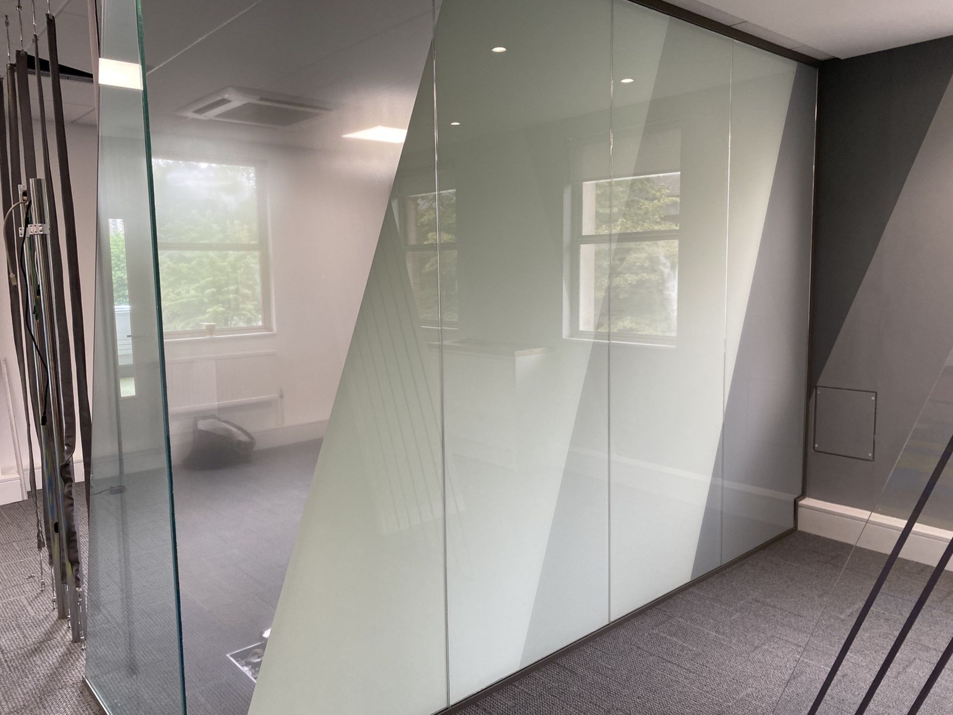 Glass office partition. Laminated