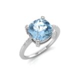 9k White Gold Diamond And Blue Topaz Ring 0.04 Carats