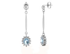 9k White Gold Diamond And Blue Topaz Earring 0.12 Carats