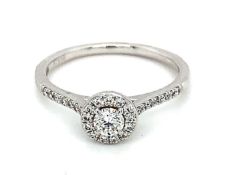 Halo Engagement Ring Set In Platinum